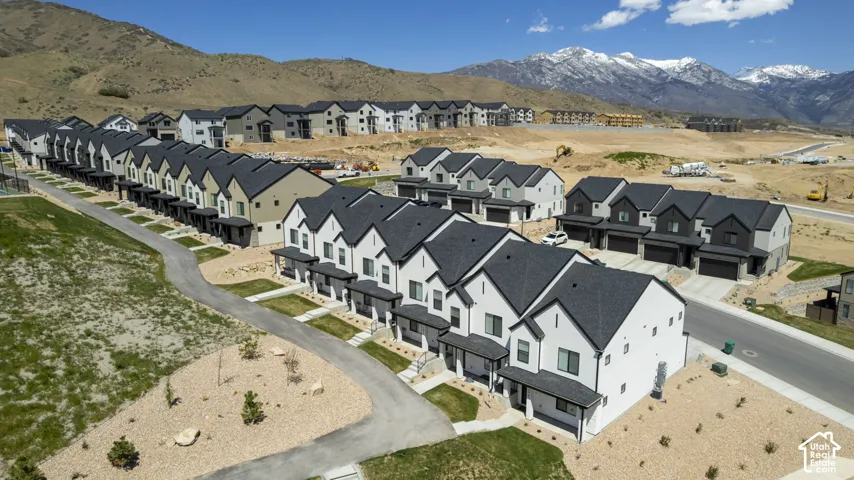 Modern townhome community featuring contemporary architectural styles and varied exterior finishes