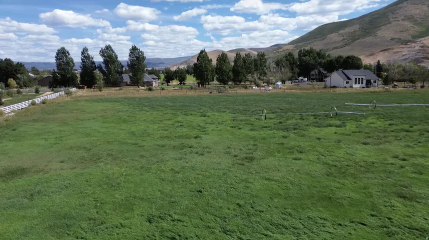 Expansive green field with irrigation system