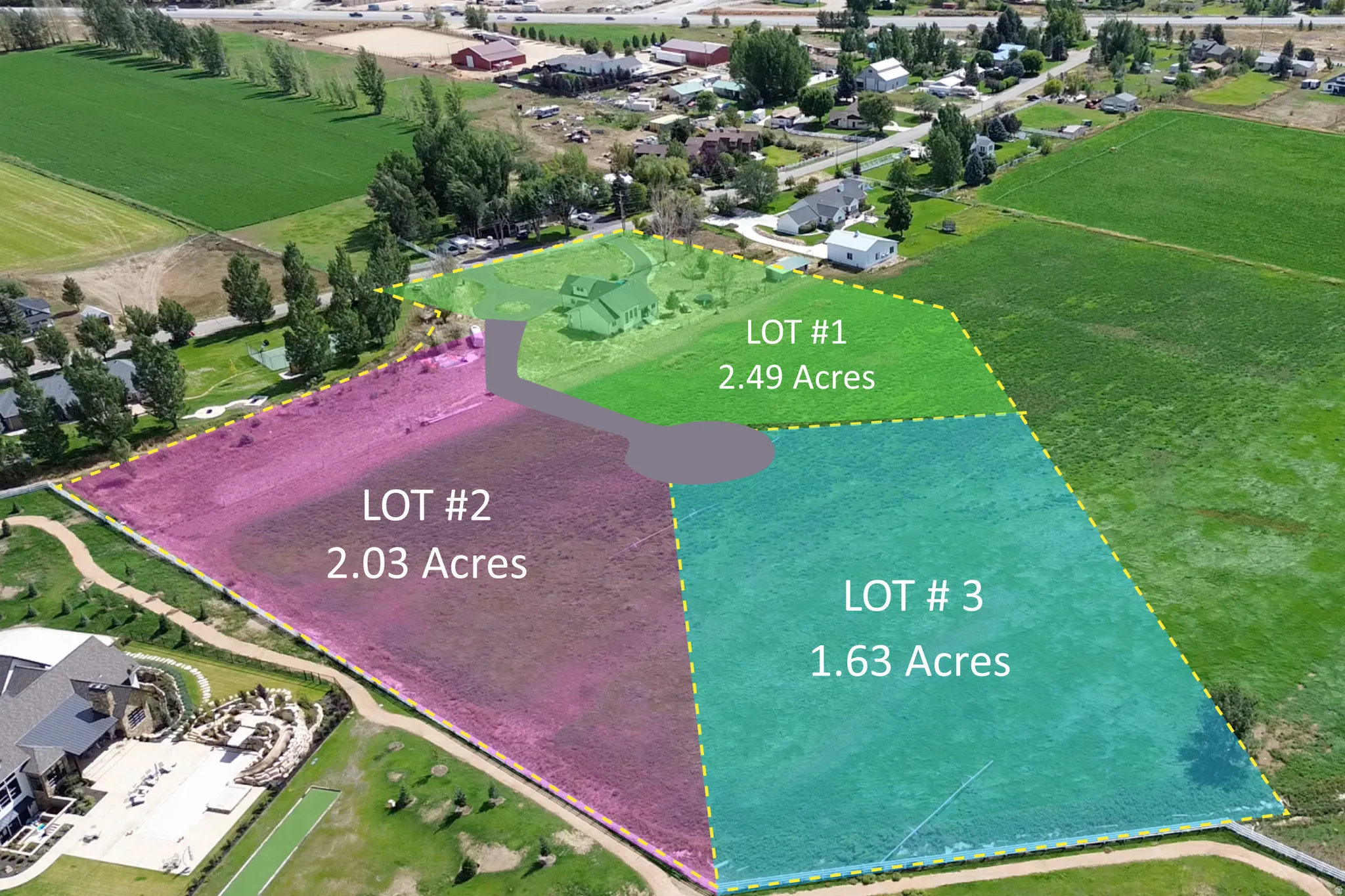 Aerial perspective showcasing three distinct land parcels