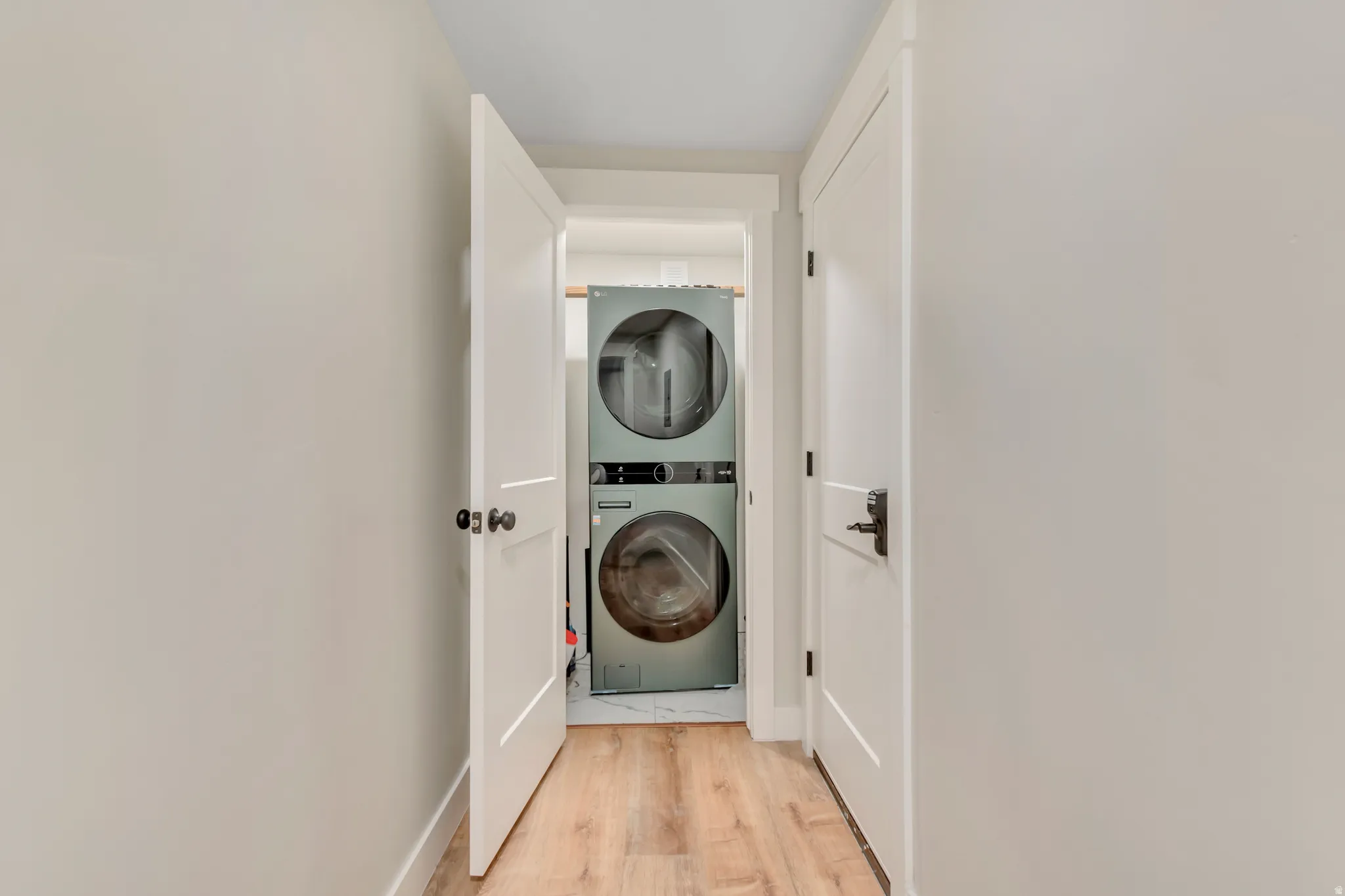Dedicated laundry closet with stacked appliances