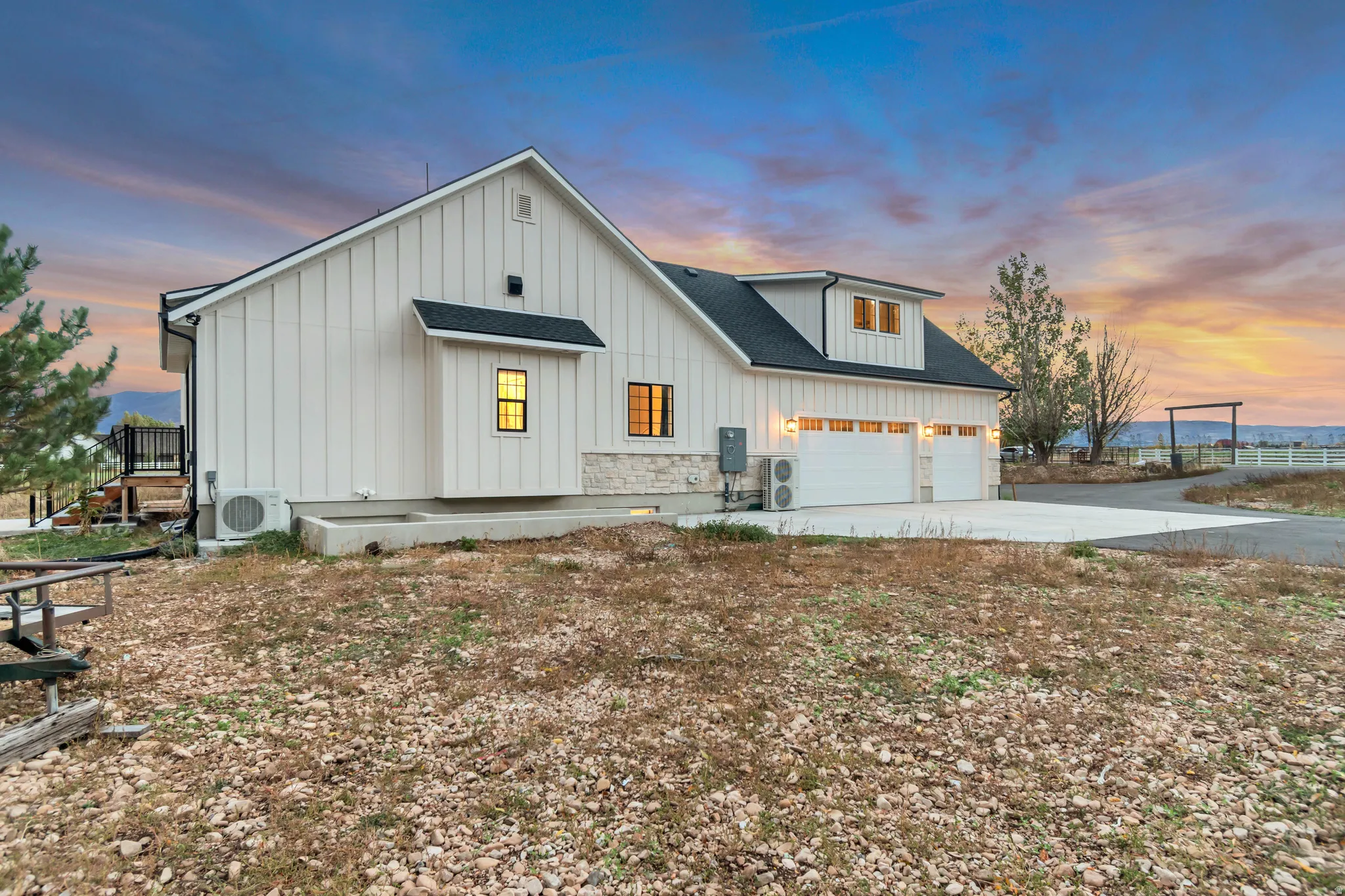 Contemporary farmhouse exterior with board and batten siding