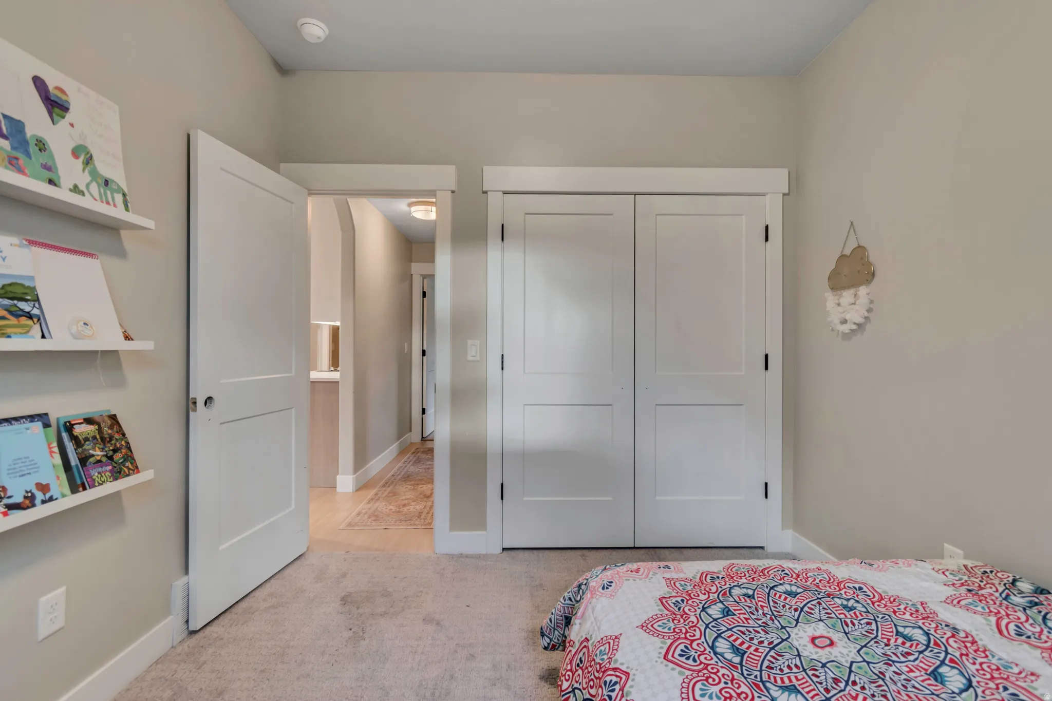 Interior room featuring light gray wall paint and white trim