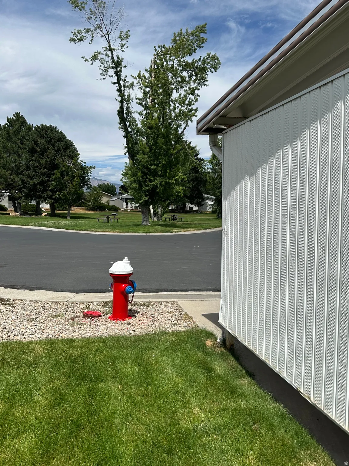 Exterior siding with brown gutters