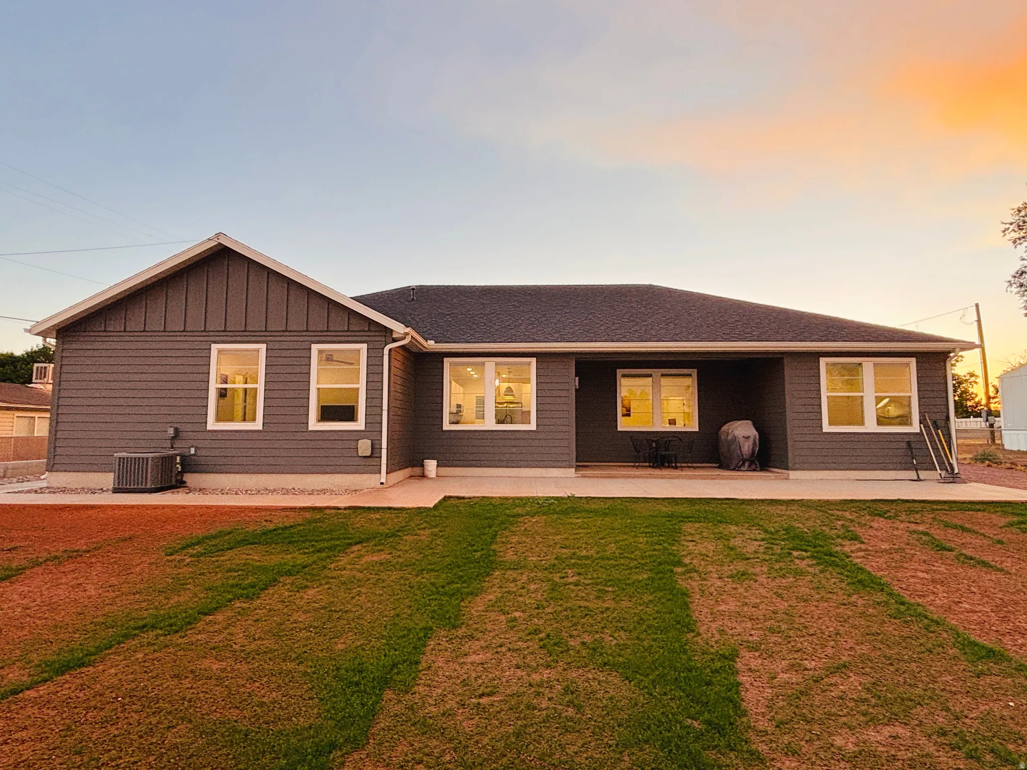 Rear exterior and east facing patio for evening shade and cool BBQ's