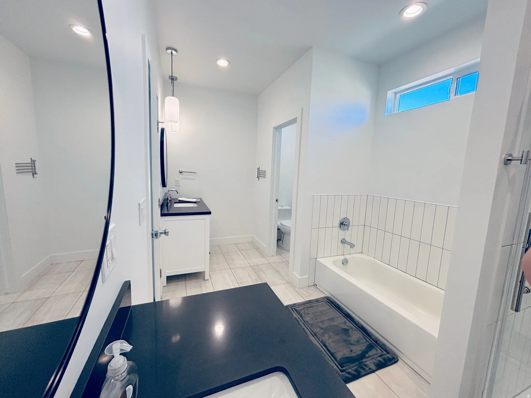 Primary bath - separate sinks, separeat, tub and shower, closed toilette room, and large walk-in closet.