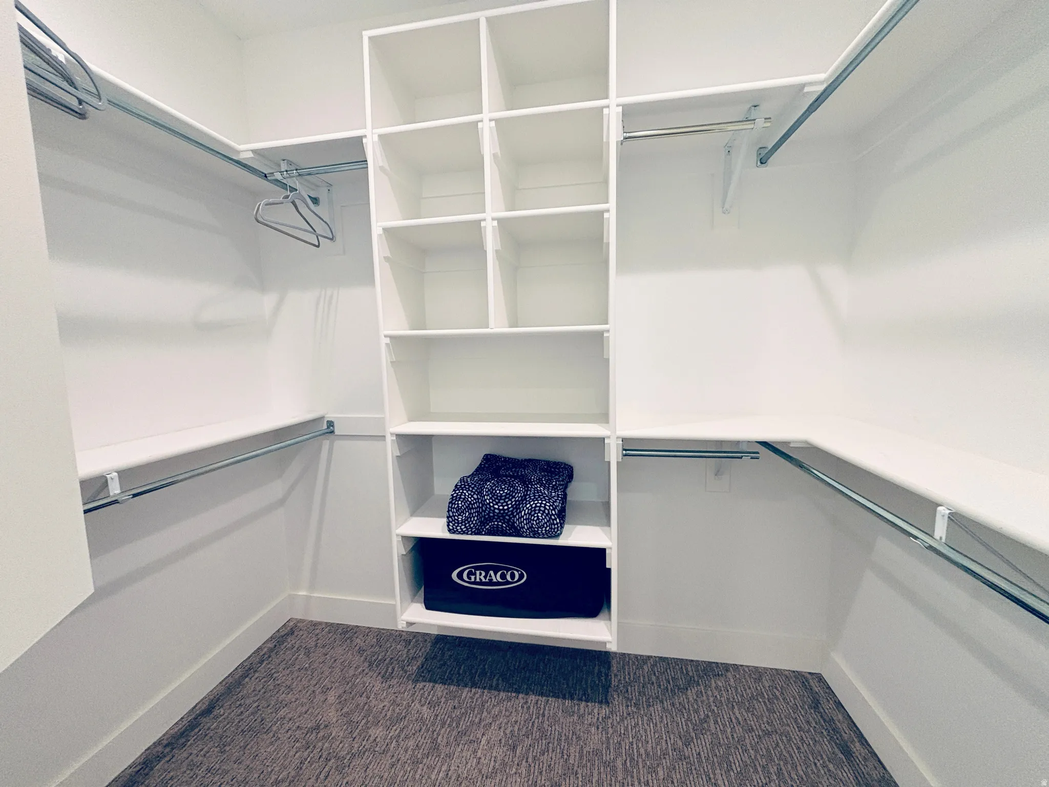 Walk-in closet in owners suite.