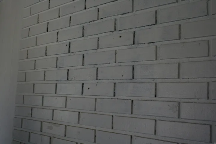 White-painted brick interior wall