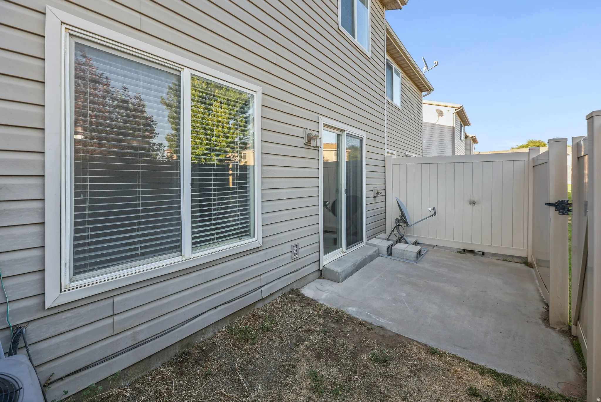 Enclosed Patio with Grass Area