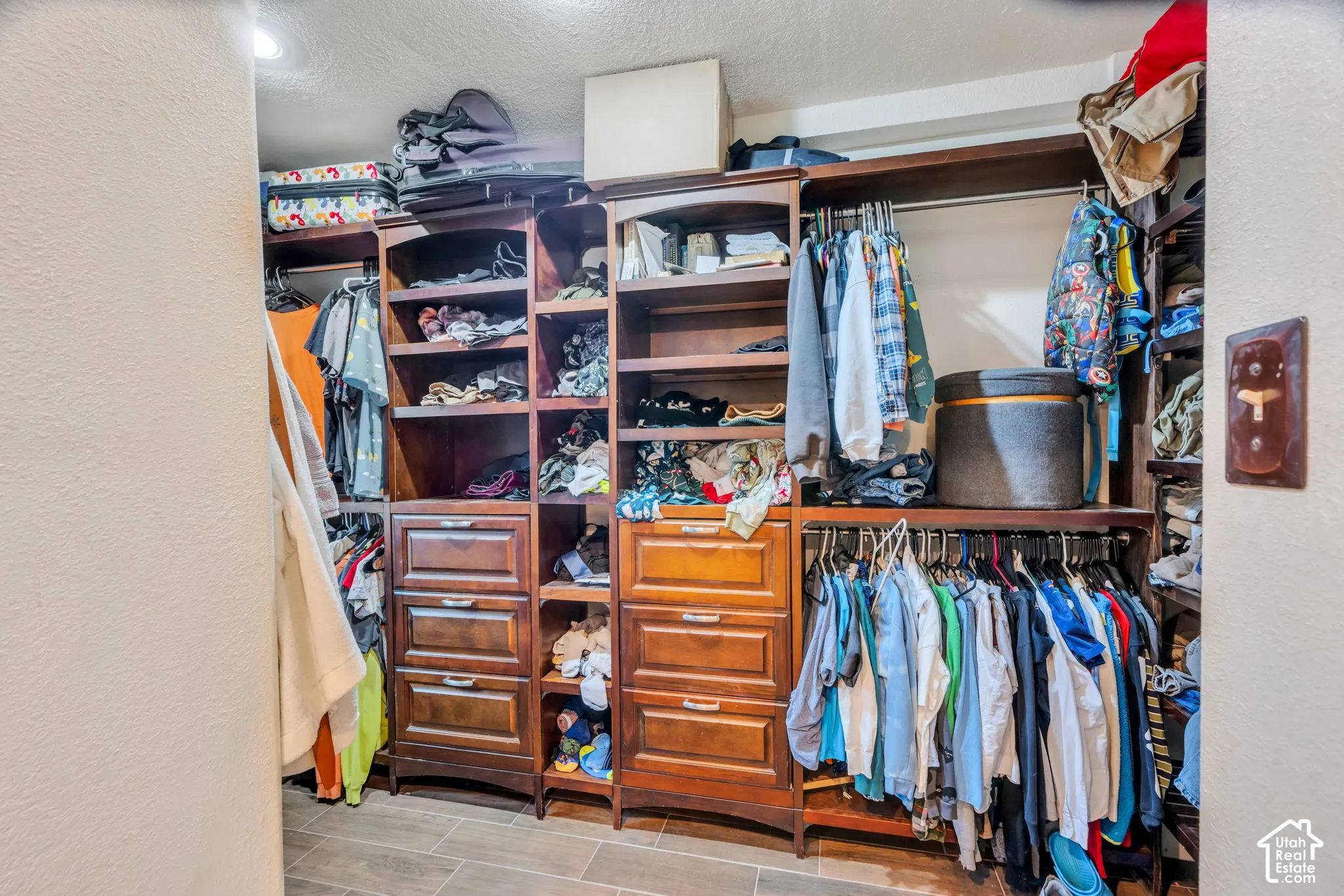 Custom walk in closet in in master suite