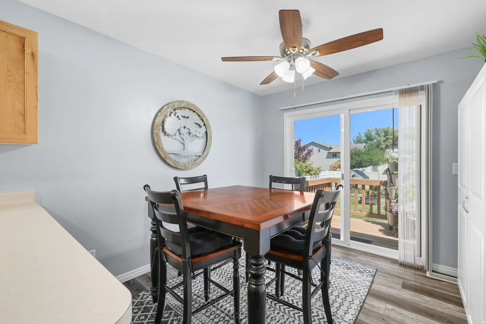 Sliding glass door opening to an outdoor deck