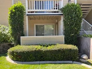 GROUND LEVEL WITH COVERED PATIO & BUILT IN SHED!