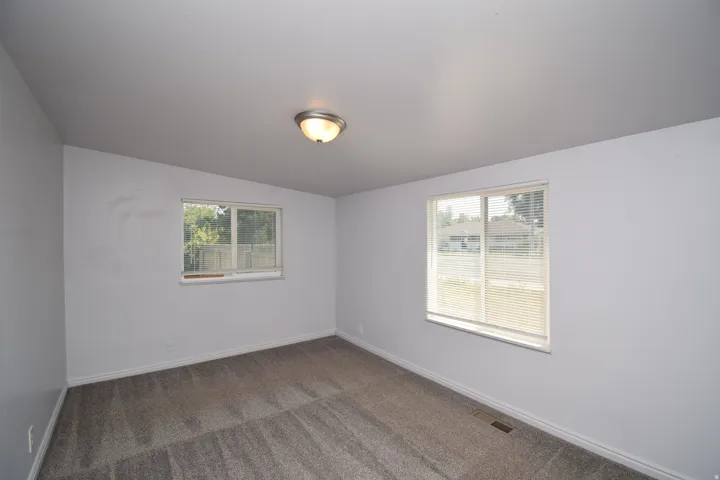 Neutral wall paint with contrasting baseboards