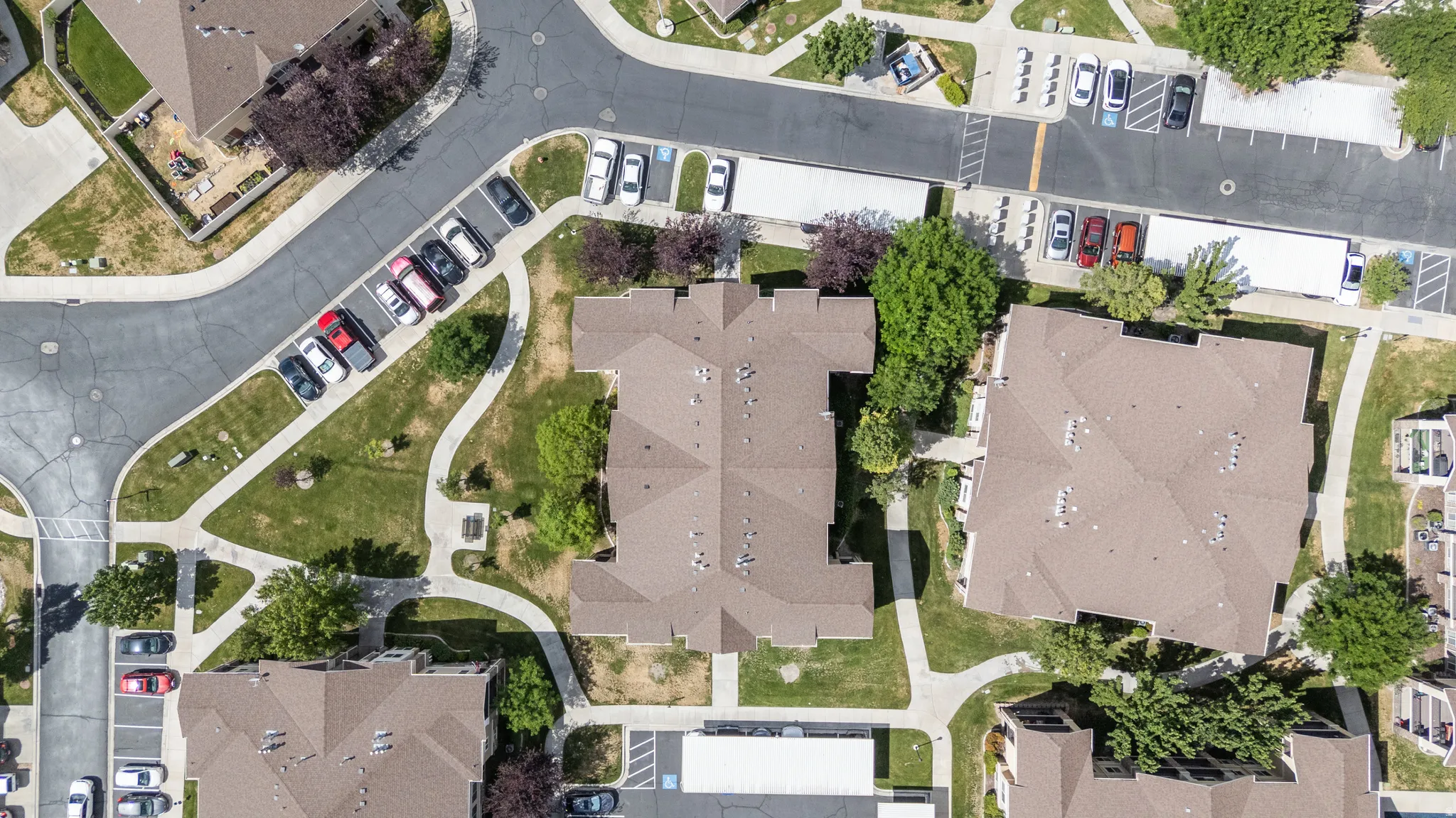 Aerial view showcasing a residential complex with multiple buildings