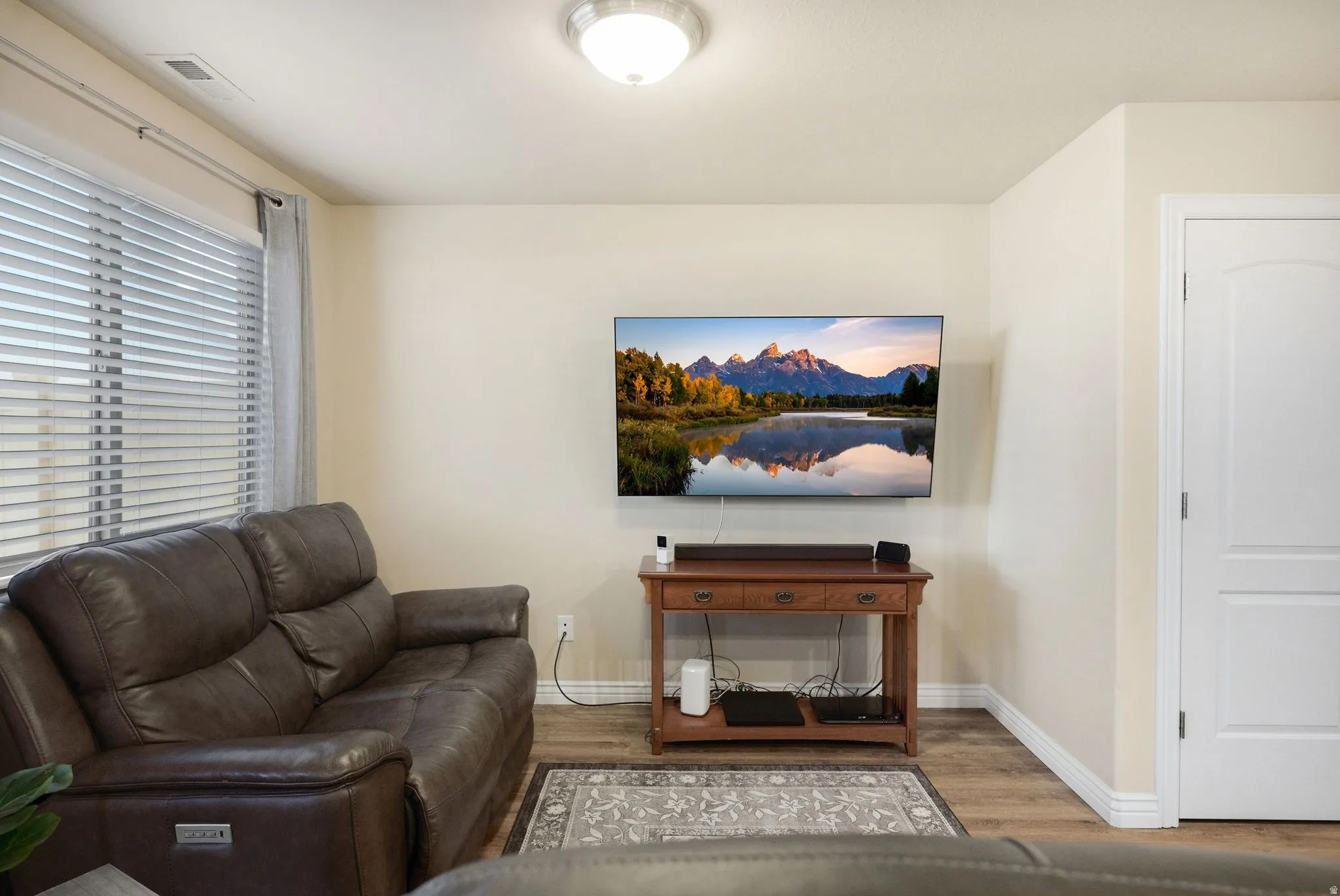 Living area featuring wood finished floors
