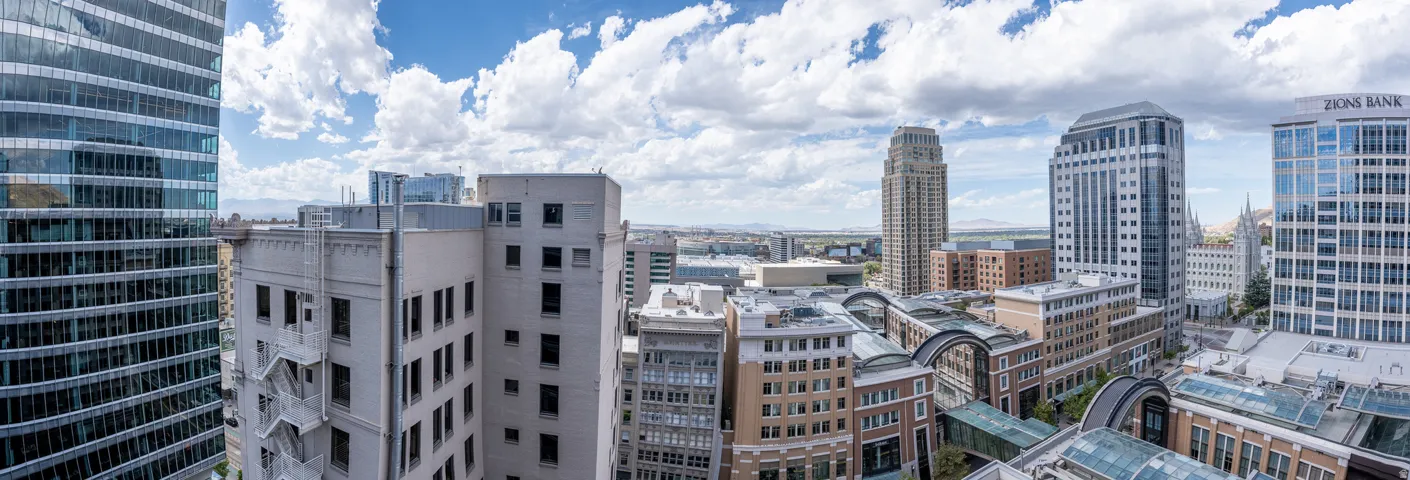 Expansive city skyline featuring multiple high-rise buildings and architectural diversity