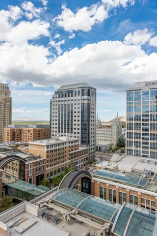 Cityscape featuring multiple high-rise buildings and architectural elements