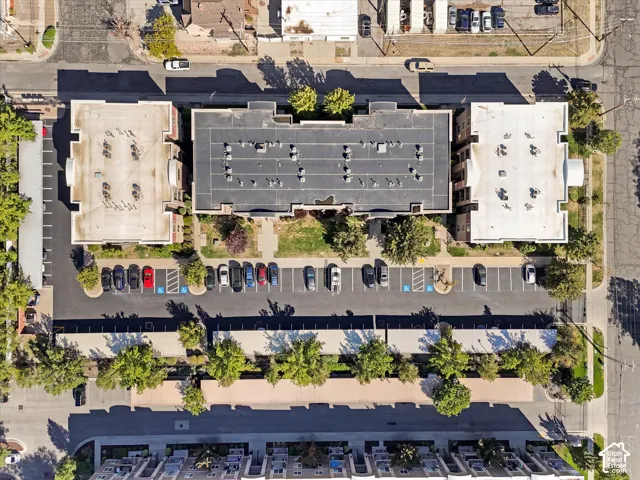 Aerial perspective highlighting the property's layout, multiple buildings, and surface parking areas