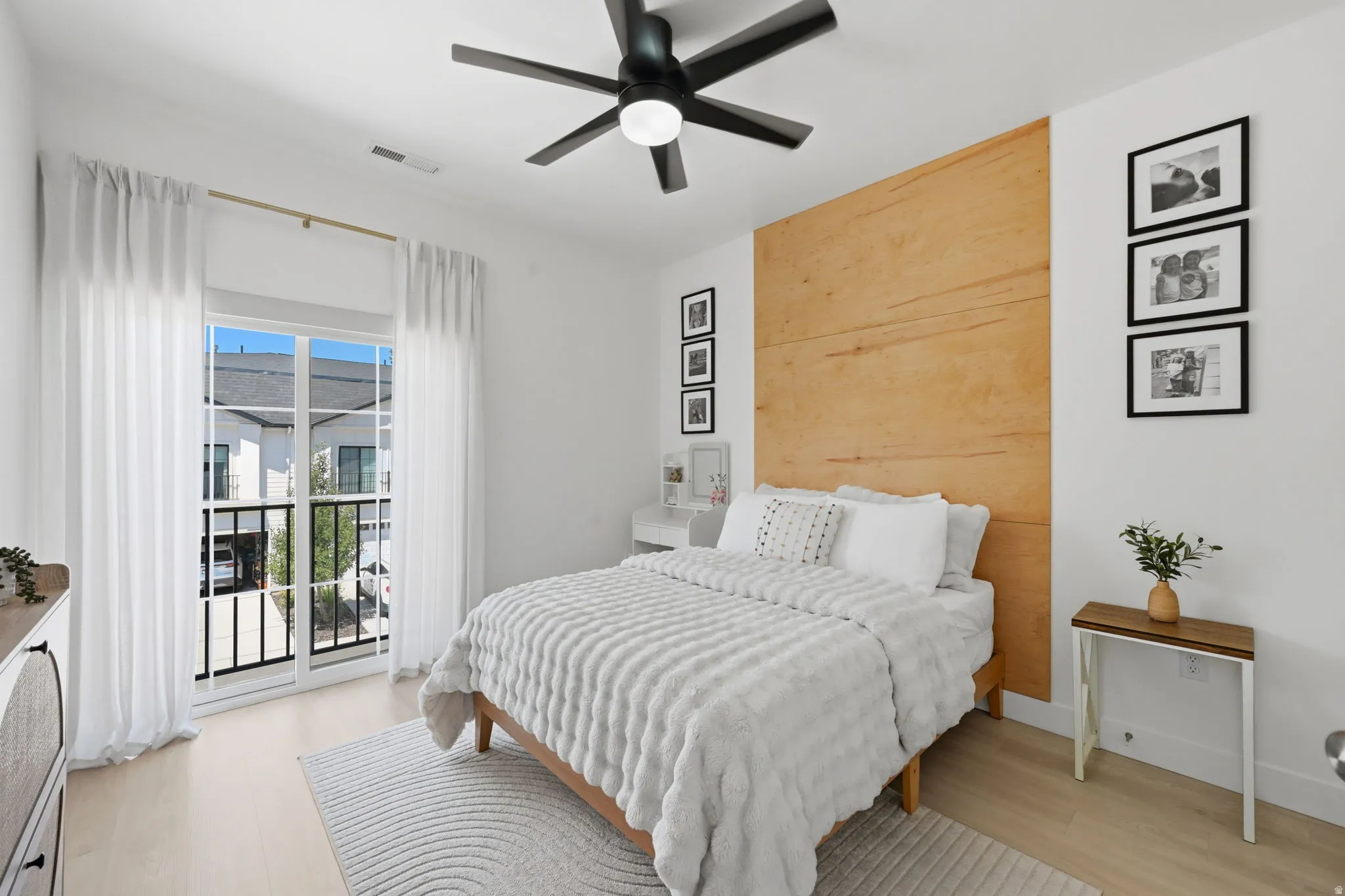 Bedroom with wood accent wall