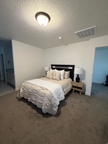 Textured ceiling with a flush-mount light fixture