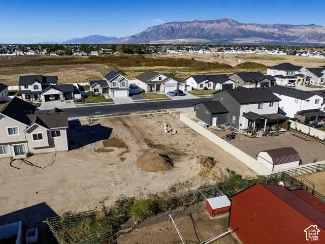 Expansive building lot with visible mountain backdrop