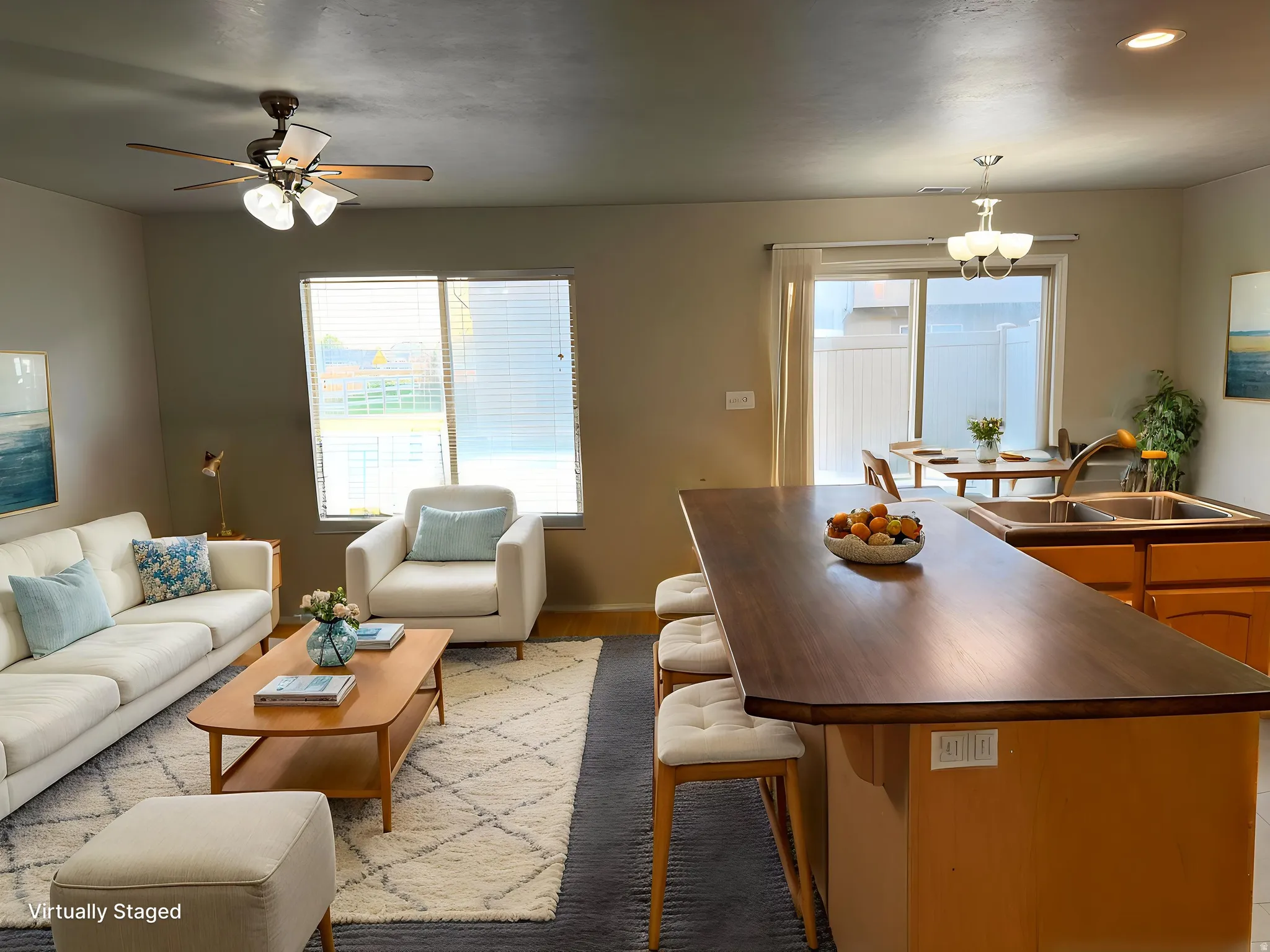 Open-concept living area featuring a ceiling fan, a window with blinds, and a sliding glass doorvirtually modified