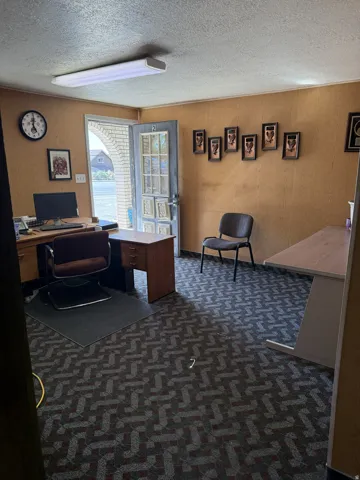 Textured carpet flooring with a repeating geometric pattern