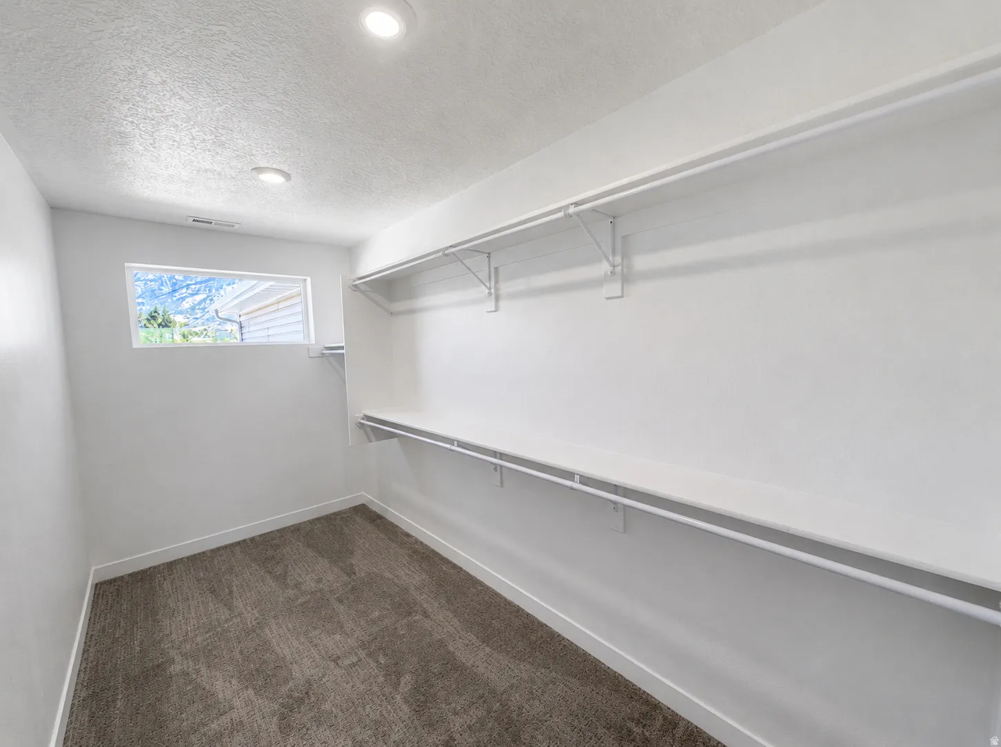 Huge walk in closet (1 of 2 in the master on suite bedroom)