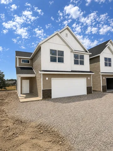 Contemporary two-story exterior with vertical and horizontal siding