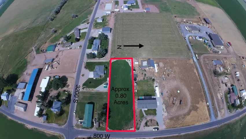 Aerial property overview highlighting an approximate 0.80-acre parcel of green space