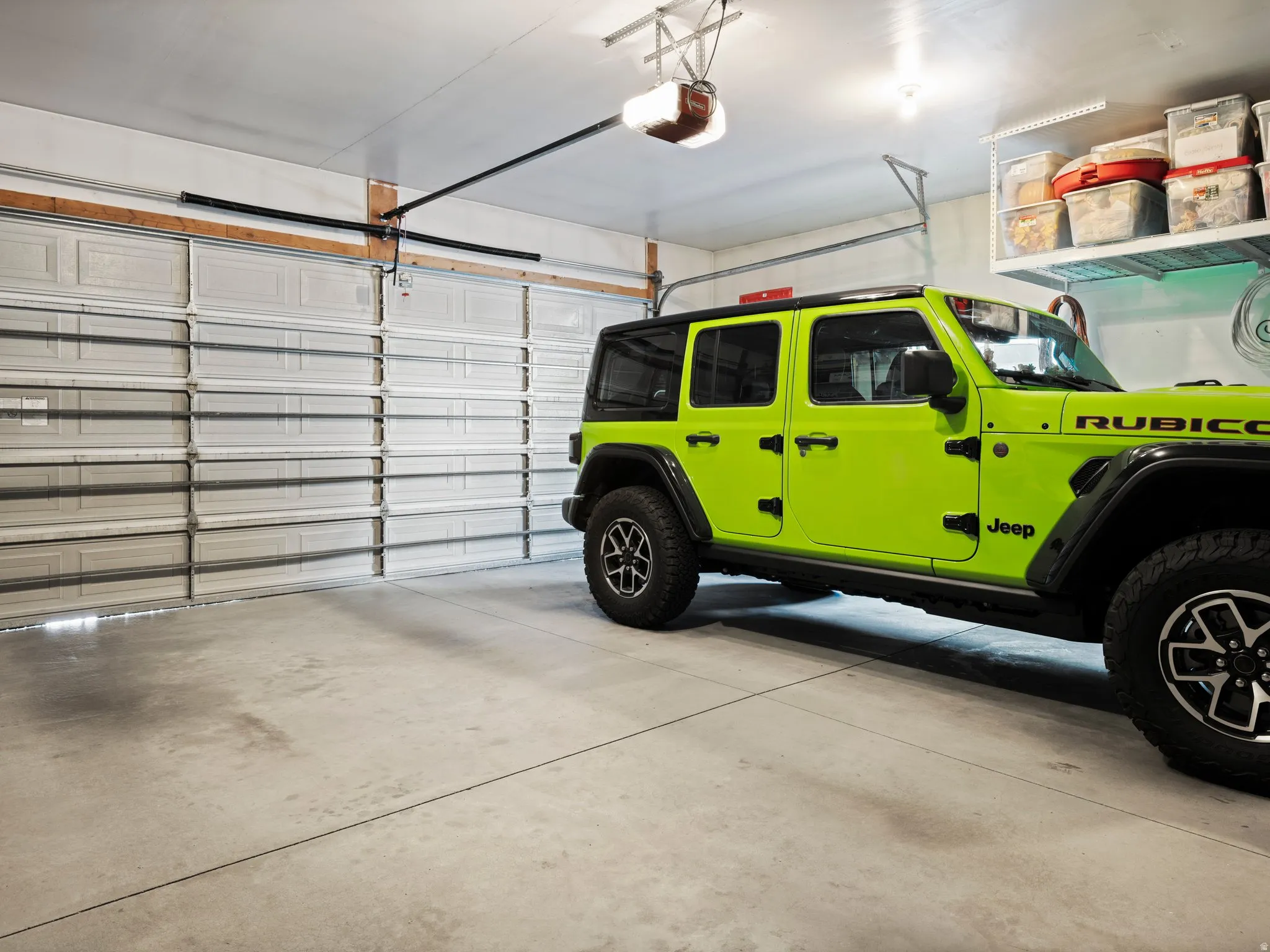 Large 2 car garage properly fits 2 vehicles including a full shize truck.