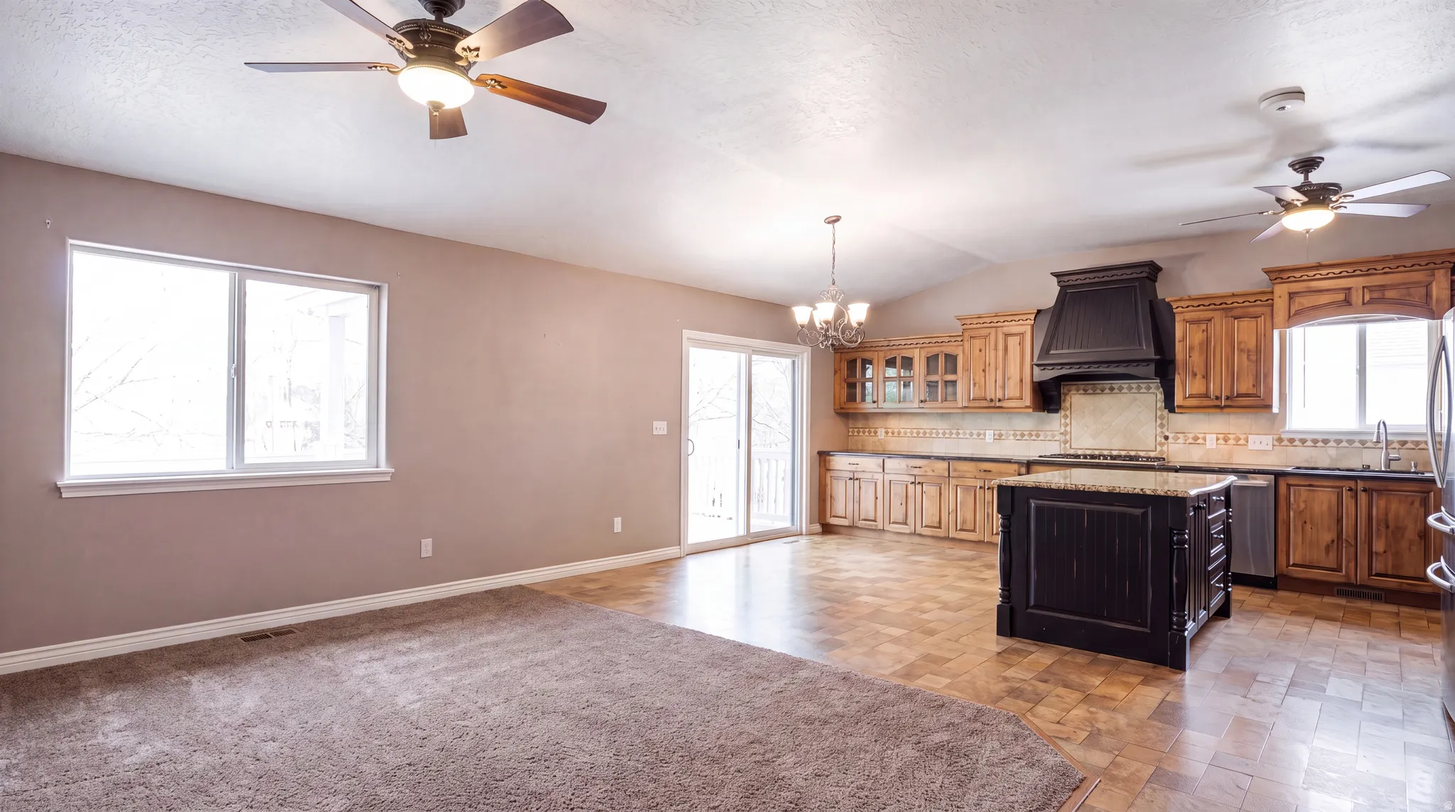 Great Room shown vacant in order to accent the neutral tones of the home.