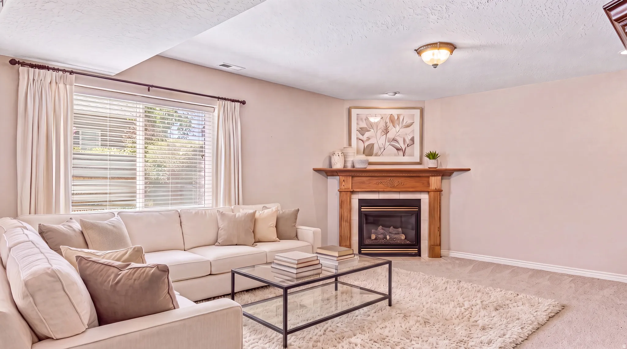 Virtually designed room to show the neutral bones of the home can carry many decor options. Continuous taupe paint virtually added for perspective