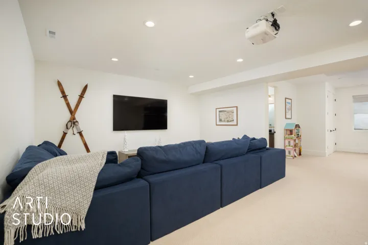 Recreation room featuring recessed lighting and plush carpeting