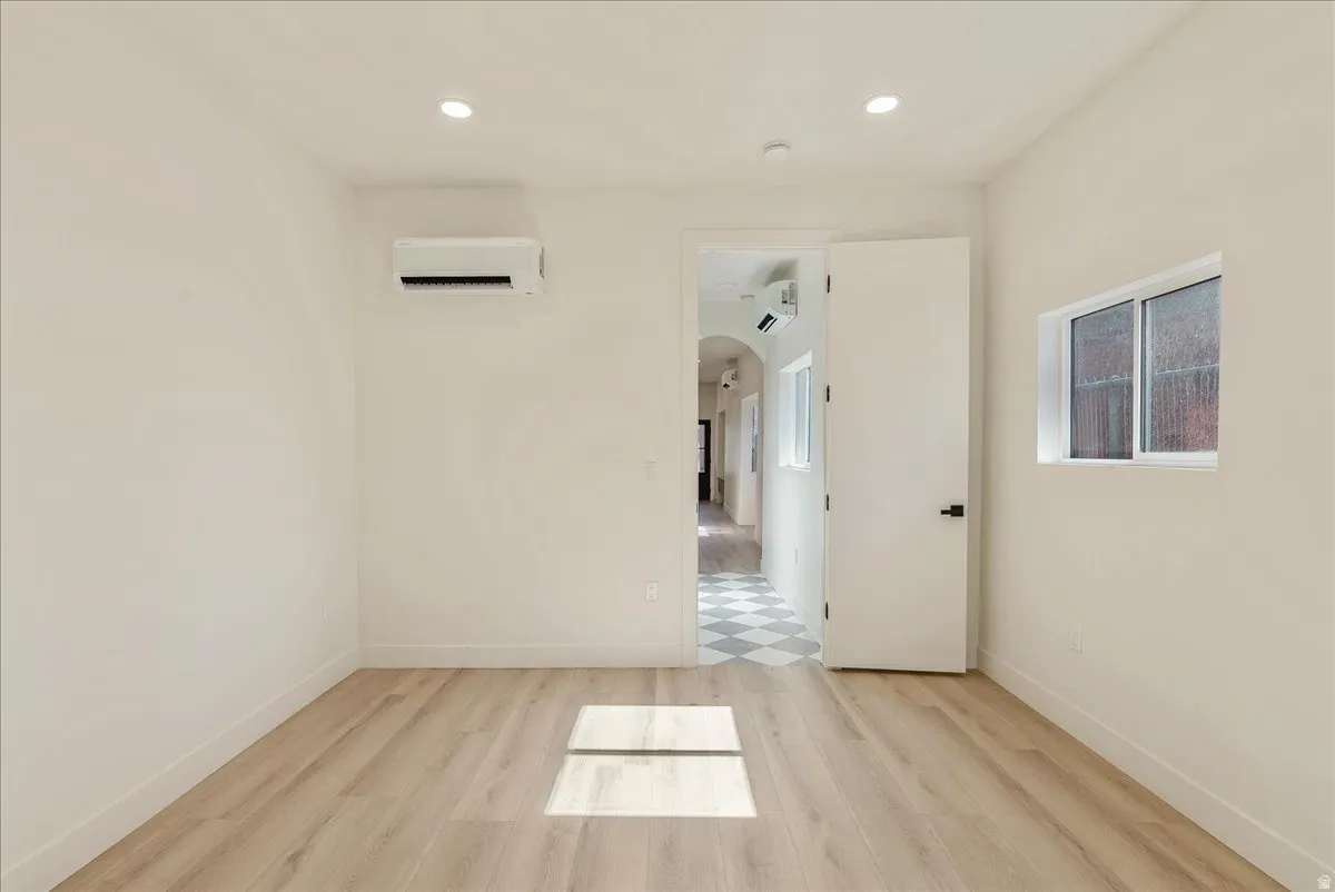 Bright interior space featuring light wood-finish flooring