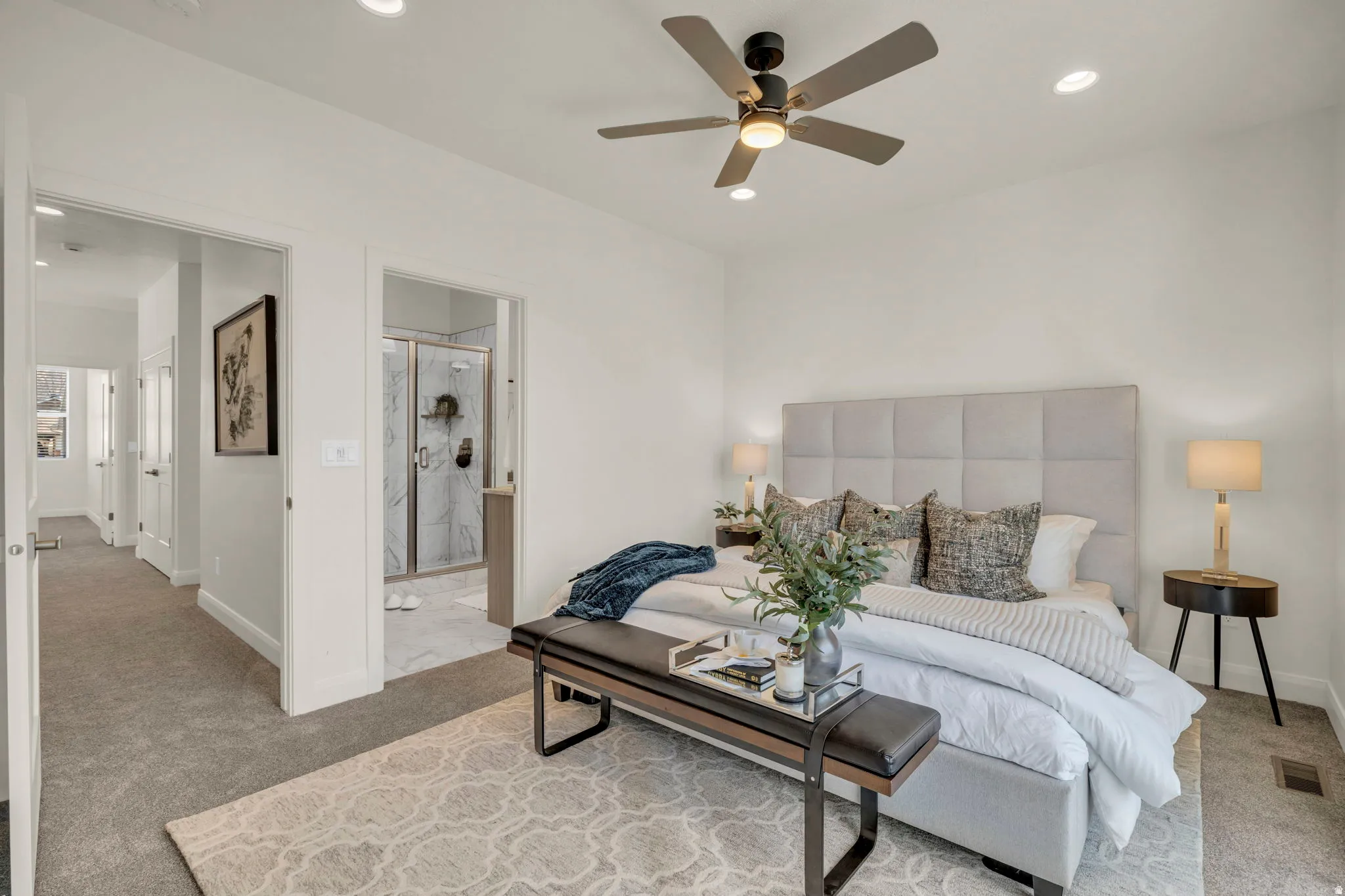 Spacious room with a ceiling fan, recessed lighting, and soft carpet flooring