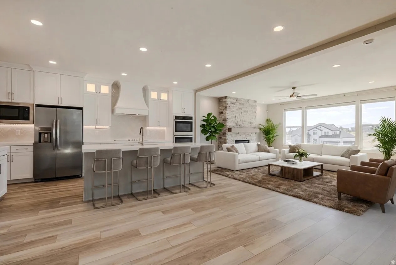 Virtual Staging. Open-concept living space featuring wood-finish flooring