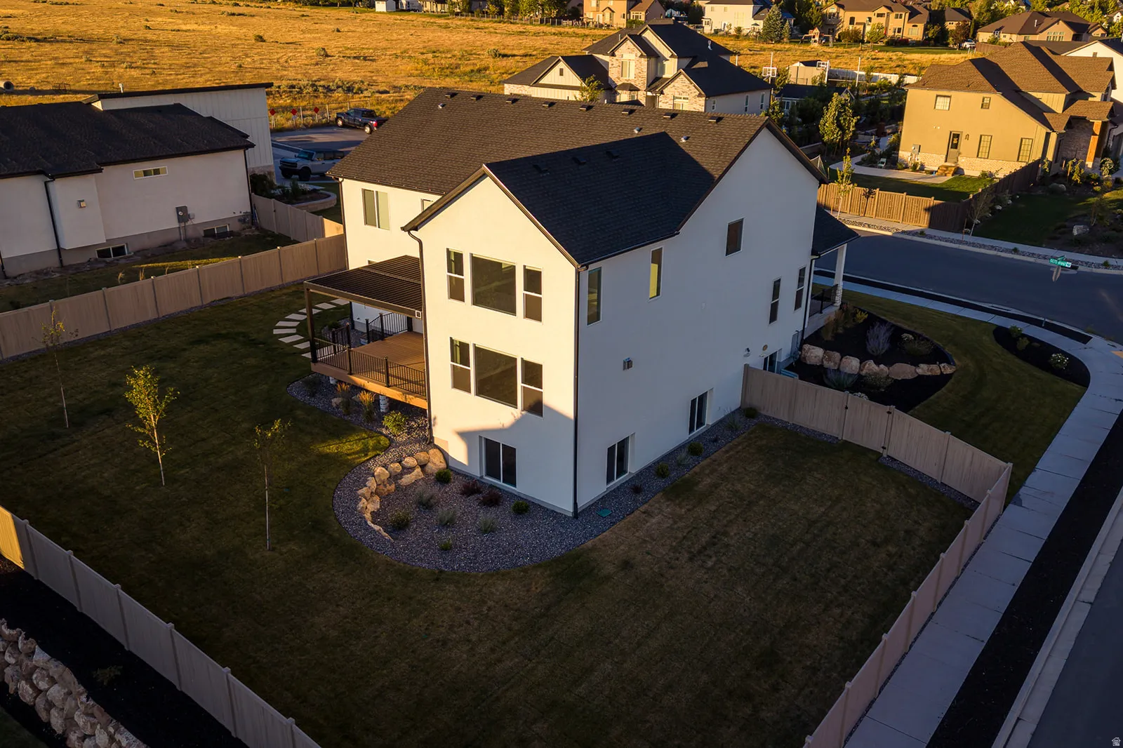 Modern white exterior with a dark-pitched roof