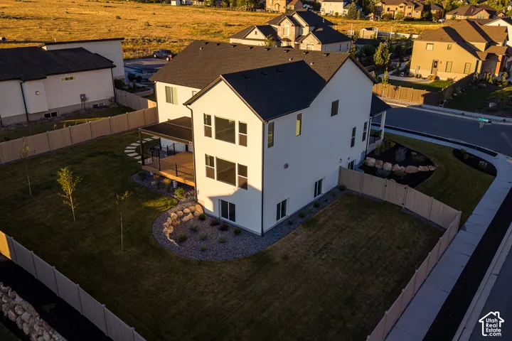 Modern white exterior with a dark-pitched roof
