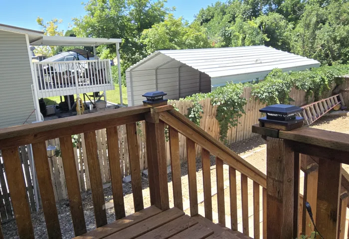 Wood deck with integrated solar post caps, providing exterior illumination