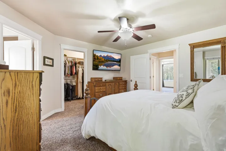 Neutral wall paint complemented by white trim and doors