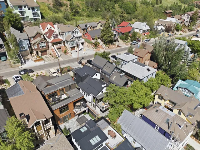 Aerial perspective showcasing a collection of residences with varied architectural styles
