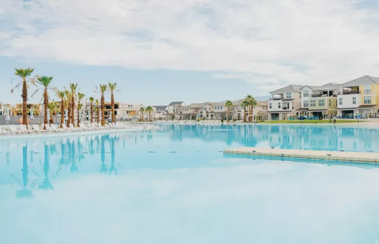 Expansive artificial lagoon surrounded by multi-story residential structures