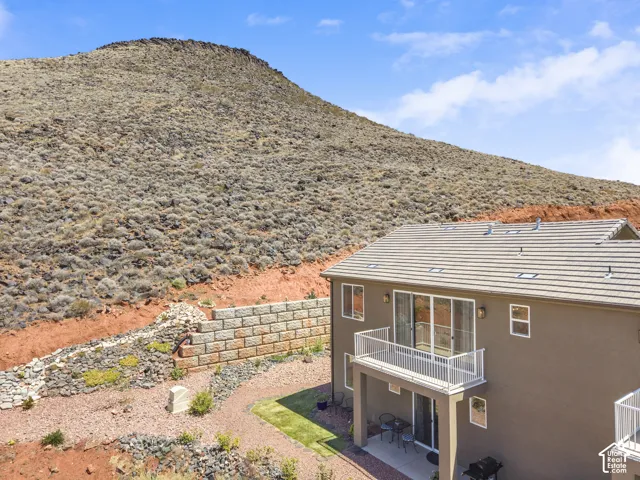 Contemporary stucco exterior with a tiled roof