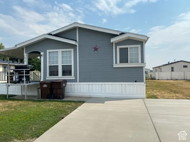 Light blue siding exterior with white trim