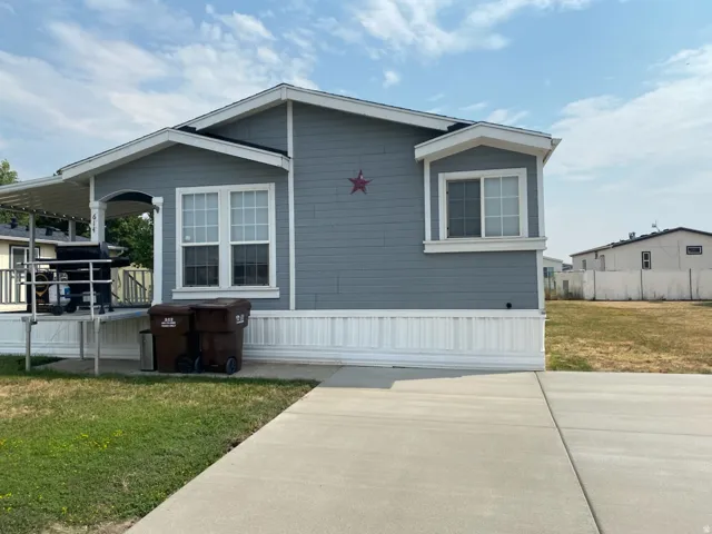 Light blue siding exterior with white trim