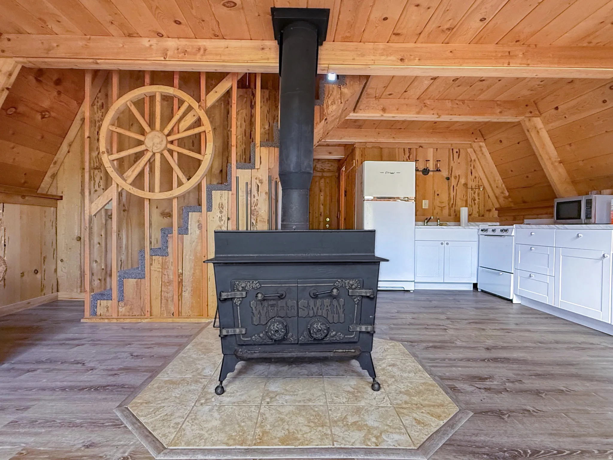 Freestanding wood-burning stove with a protective tiled hearth