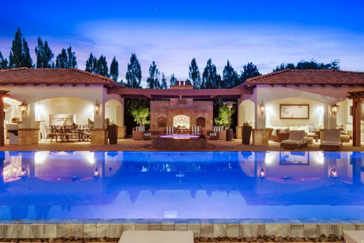 Resort-style pool with a broad coping and tiled waterline