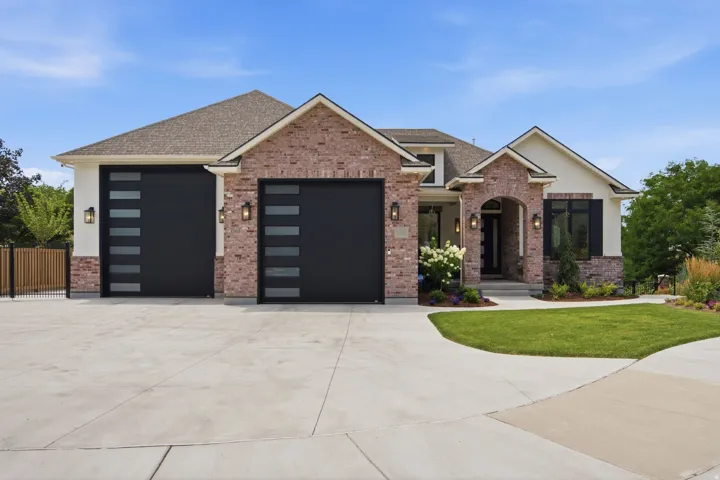 Guest House Brick and stucco exterior with gabled roofline