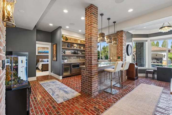 Brick flooring throughout the entertainment area