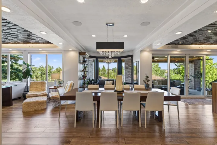 Spacious dining area with wood-finish flooring
